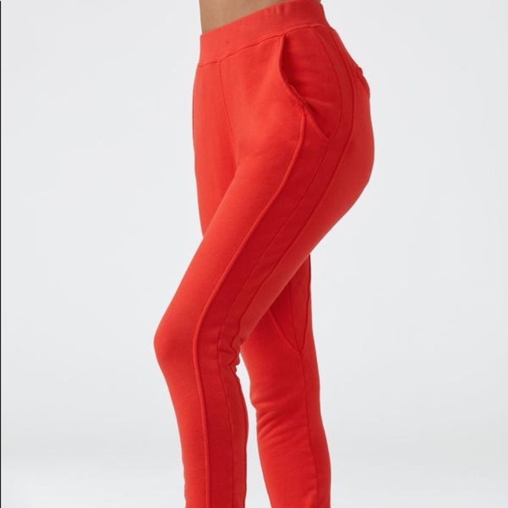 Joan Brown 	
STADIUM JOGGER
HOT SAUCE FRENCH TERRY